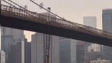 Barge carrying crane collides with New York City's iconic Brooklyn Bridge, incurs minor damages | Video