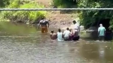Footballer, 29, killed by crocodile while cooling off in river