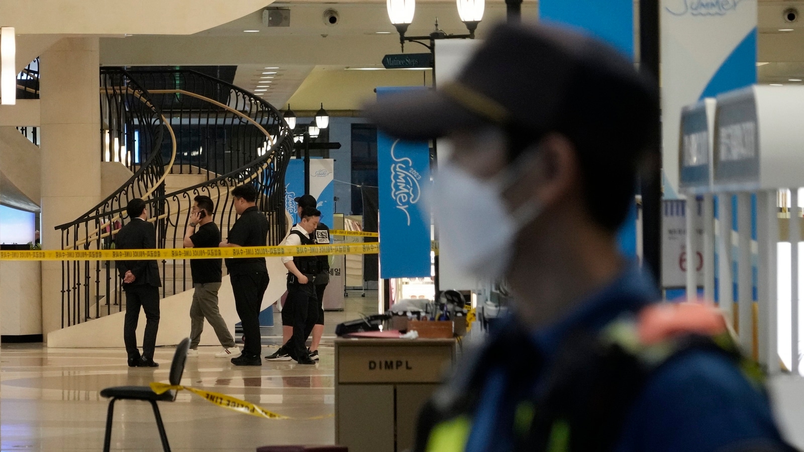 Man rams car onto sidewalk in South Korea and stabs people; at least 14 hurt