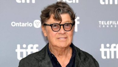 Robbie Robertson, lead guitarist and songwriter of The Band, dies at 80