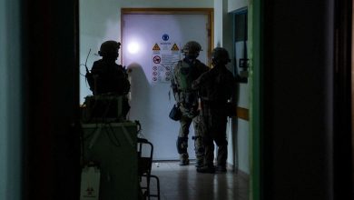 Israel searches for traces of Hamas in raid of key Gaza hospital packed with patients