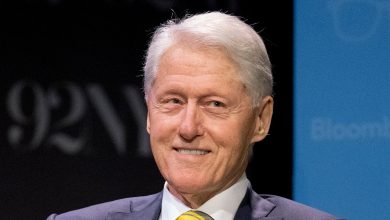 Bill Clinton spotted smiling, greeting passerby in Mexico hours after being named in Jeffrey Epstein list
