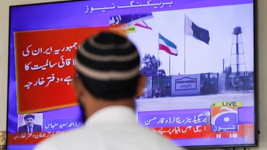 A man looks at a television screen after the Pakistani foreign ministry said the country conducted strikes inside Iran targeting separatist militants, two days after Tehran said it attacked Israel-linked militant bases inside Pakistani territory, in Karachi, Pakistan January 18.(Reuters.)