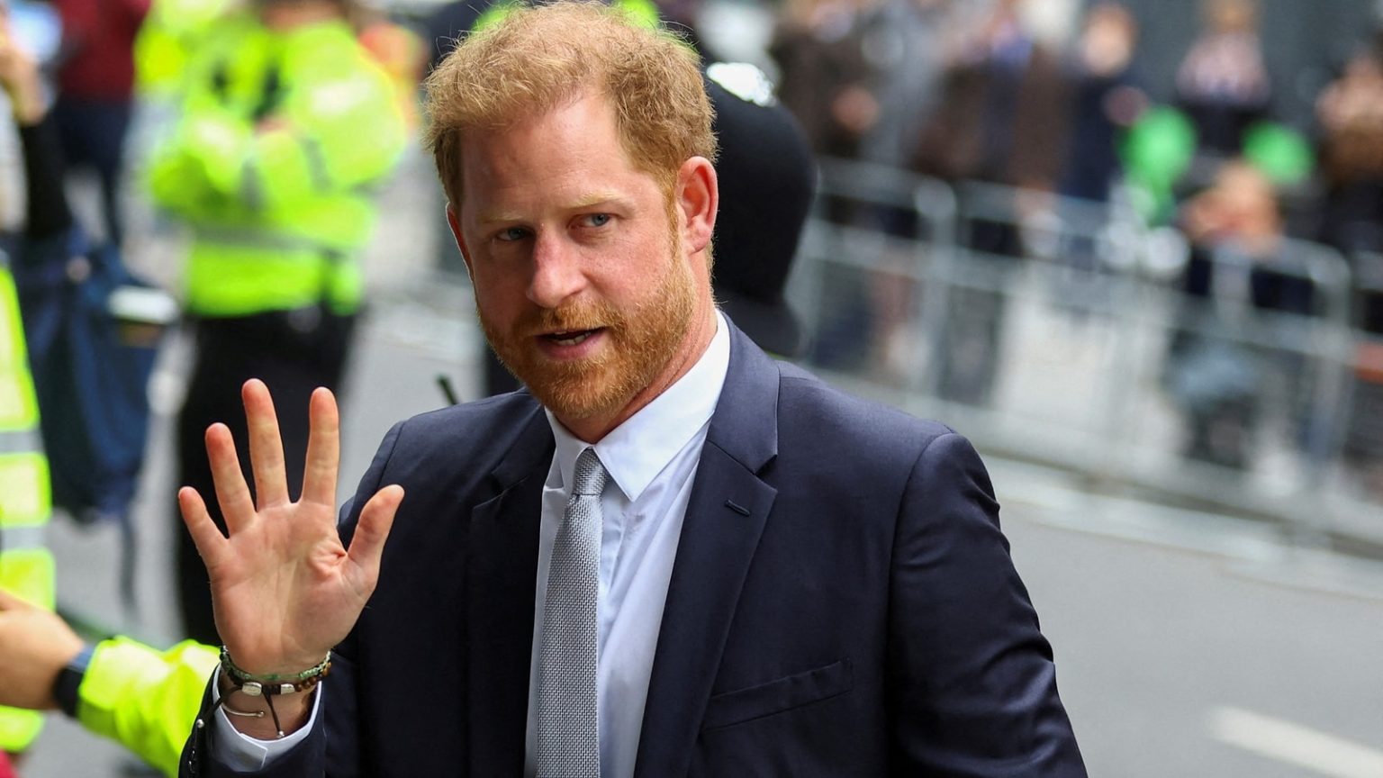 Prince Harry appears woefully pensive after unexpected appearance at