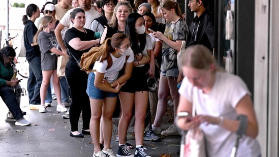 Fans of US singer Taylor Swift, also known as Swifties, queue for a ticket in the final allocation for Swift's three shows in Melbourne on February 13, 2024. Taylor Swift is playing to 260,000 fans over three concerts in Melbourne starting February 16 as part of her Eras World Tour. (Photo by William WEST / AFP)(AFP)
