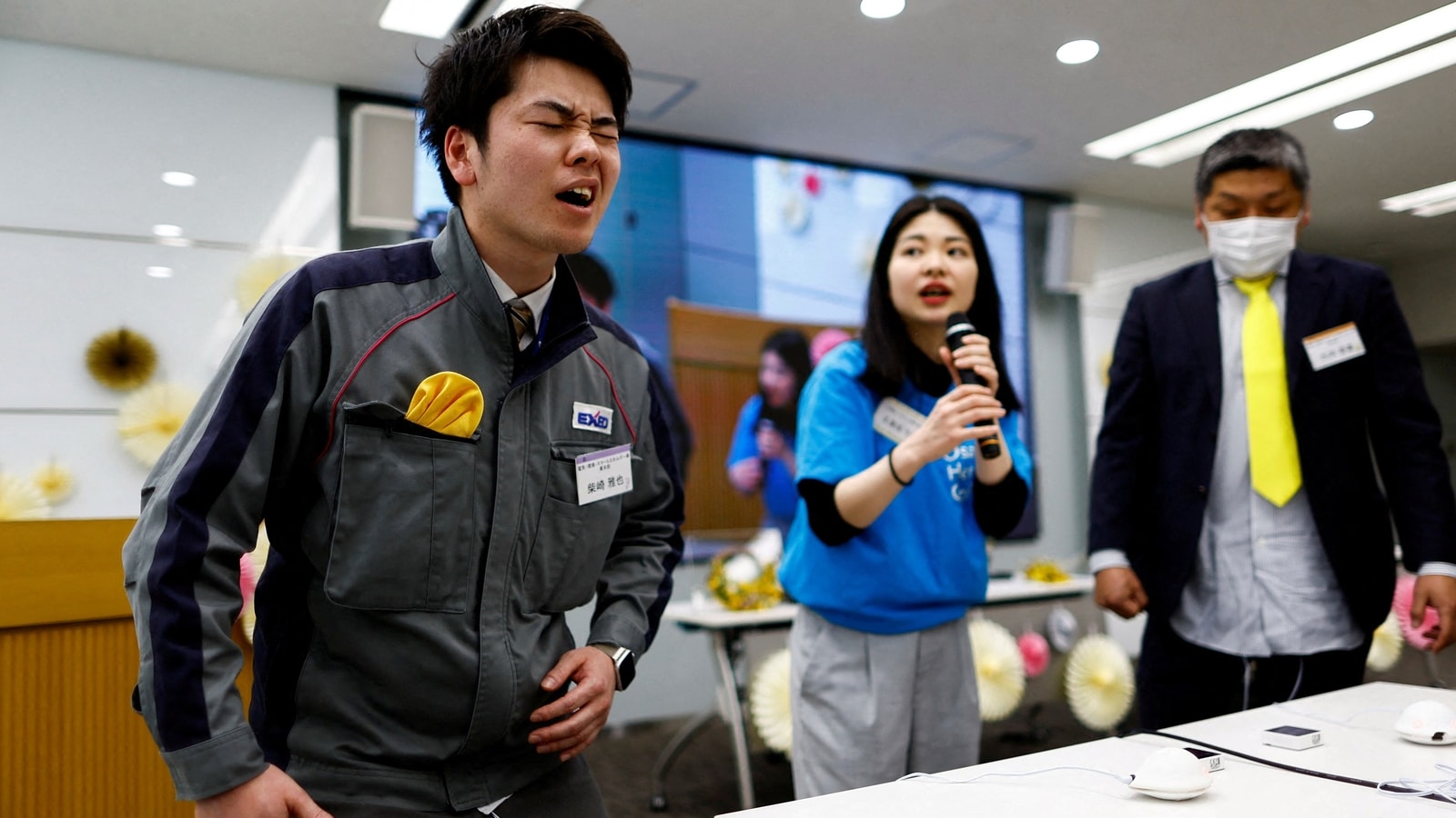 Japanese male workers experience simulated menstrual pain in awareness campaign