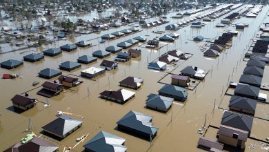 Russia and Kazakhstan battle record floods as rivers rise further