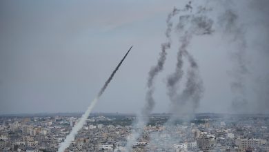 Hezbollah fires scores of rockets at northern Israel as Gaza cease-fire talks hang in the balance