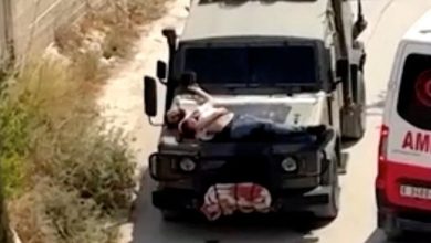 Israeli troops strap injured Palestine man atop army jeep during arrest in West Bank city