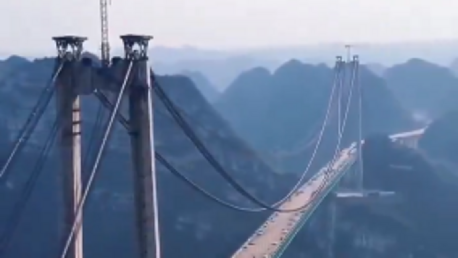 China to open world's highest bridge, 200 m higher than Eiffel Tower: Report 1 China to open world's highest bridge, 200 m higher than Eiffel Tower: Report