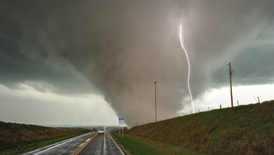 Watch: Rare moment massive tornado crosses a rainbow
