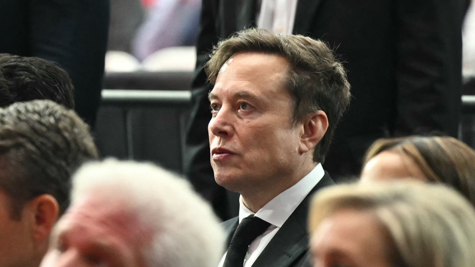 Trump and Elon Musk reunite at Charlie Kirk's funeral amid H-1B chaos, seen chatting